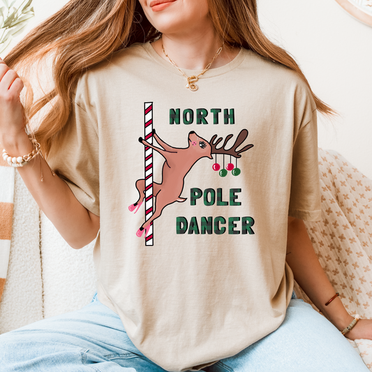 "North Pole Dancer" Funny Christmas T-Shirt – Naughty Holiday Humor for the Bold & Festive